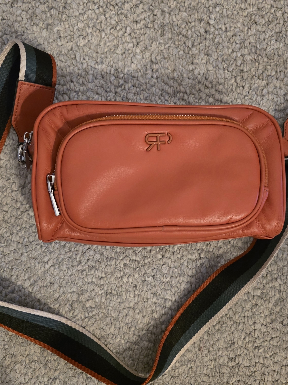 Coral Crossbody Leather Sling with Striped Webbing Strap